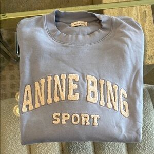 ANINE BING “sport”
embroidered-logo organic cotton sweatshirt